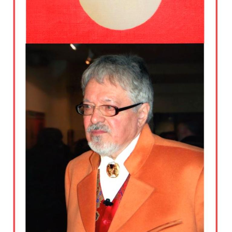 Photograph of a person wearing an orange suit jacket, white shirt, and a bolo tie with a decorative clasp, standing indoors with a blurred face. Above the person is a red rectangular panel featuring a large white circle centered within it.